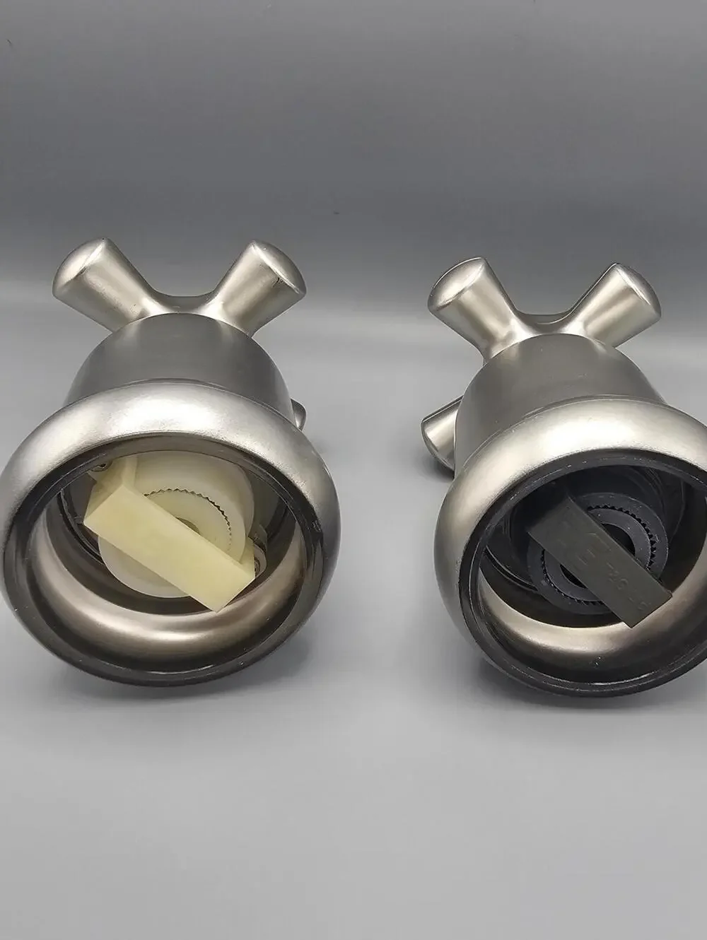 Set of Two Silver salt and pepper shakers with Cross Design